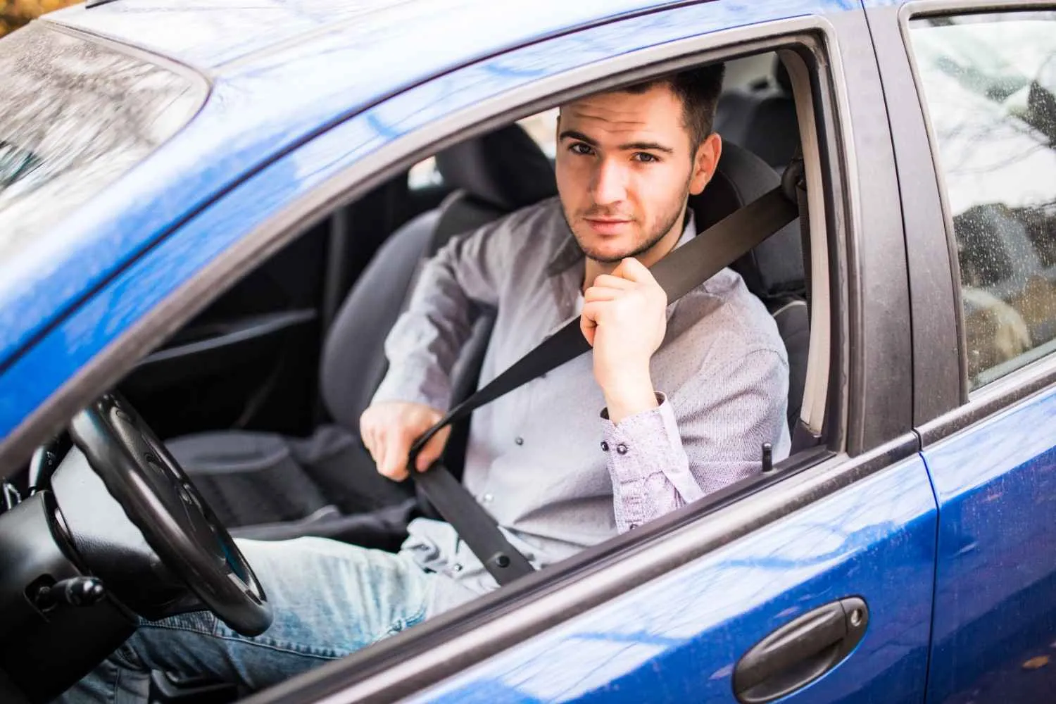 Driver behind the wheel of a car